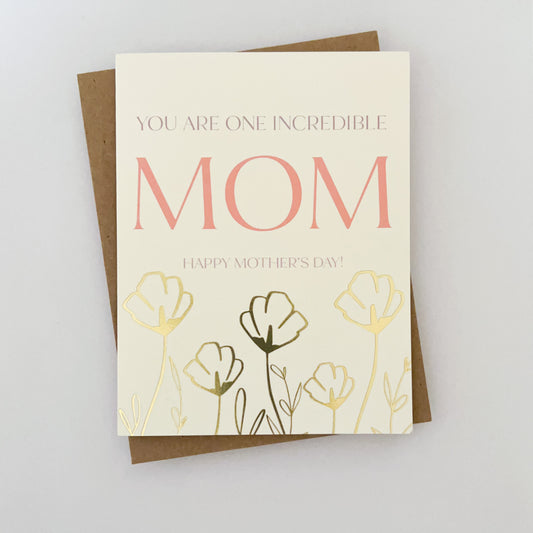 A mothers day card with gold foil florals and text that reads 'you are one incredible MOM happy mothers day!'