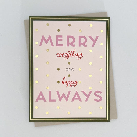 A holiday card with pink background, gold foil dots, green and gold border and text that reads 'Merry Everything and Happy Always'.